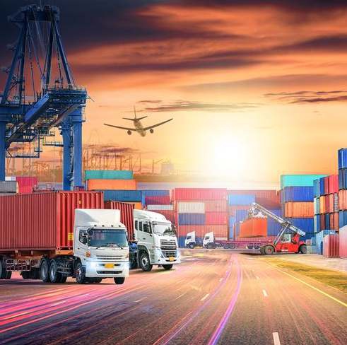 Freight truck and cargo aircraft in a multimodal shipping scene from the company profile